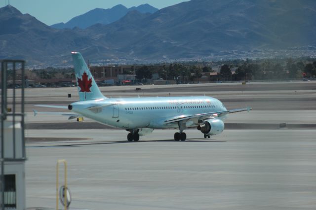 Airbus A320 (C-FZUB) - 013013 Air Canada to YYZ taxiing out to Rwy 25R