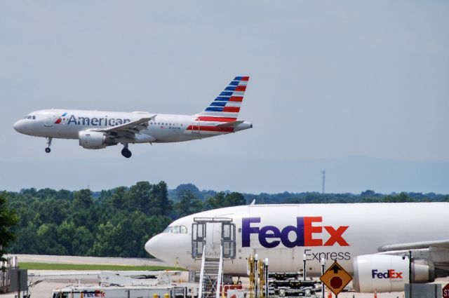 Airbus A319 (N746UW) - The old and new Airbus family at GSP.  7/10/21.