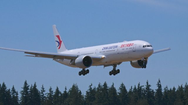 BOEING 777-300 (B-7882) - BOE470 on final to Rwy 34L to complete a C1 flight on 7.17.17. (ln 1508 / cn 43287).