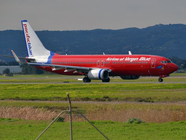 Boeing 737-800 (VH-VOX) - On taxi-way heading for take off on runway 05. Thursday 12th July 2012.