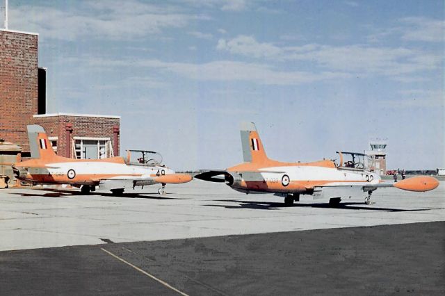 MACCHI MB-326 (A733) - Macchi MB326H A7-049 and A7-033 Pearce (YPEA) early 1970s.