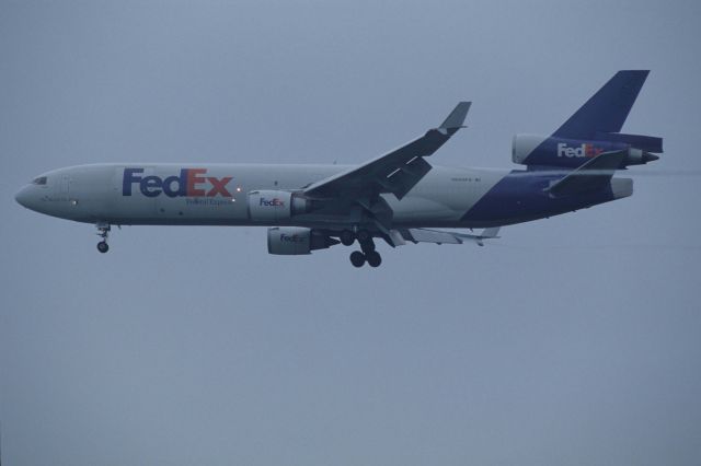 Boeing MD-11 (N603FE) - Final Approach to Narita Intl Airport Rwy34L on 1995/05/03