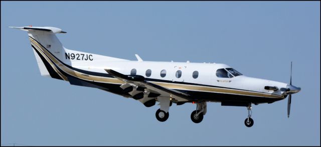 Pilatus PC-12 (N927JC) - Over the runways threshold