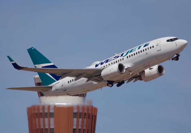 Boeing 737-700 (C-GWJE) - Departing Sky Harbor (View in "full" for highest image quality)