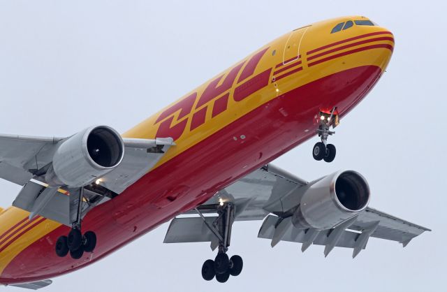 — — - DHL, A300F, on short finals to LHR.