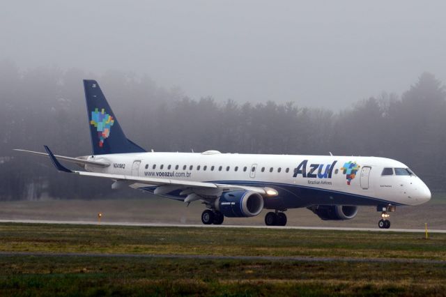 Embraer ERJ-190 (N241MQ) - Nomadic 562 ex Azul E190 rolling down 16 for Keflavik she came in the night before from San Bernadino