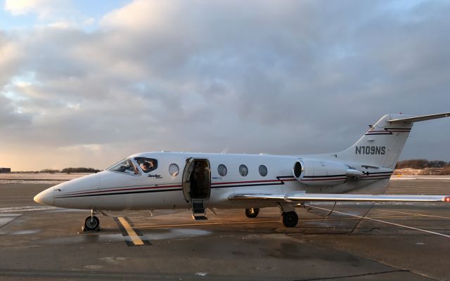 Beechcraft Beechjet (N109NS) - From gate D88 at KPIT, walking across taxiway, about to board flight # 1417 to BDL. Feb 16 2017 at 17:39.