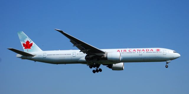 BOEING 777-300 (C-FIUL) - Taken from the threshold of 29L