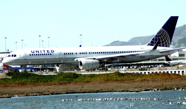 Boeing 777-200 (N34137) - Taxiing to 1R for Take Off to KEWR, 02/24/2012