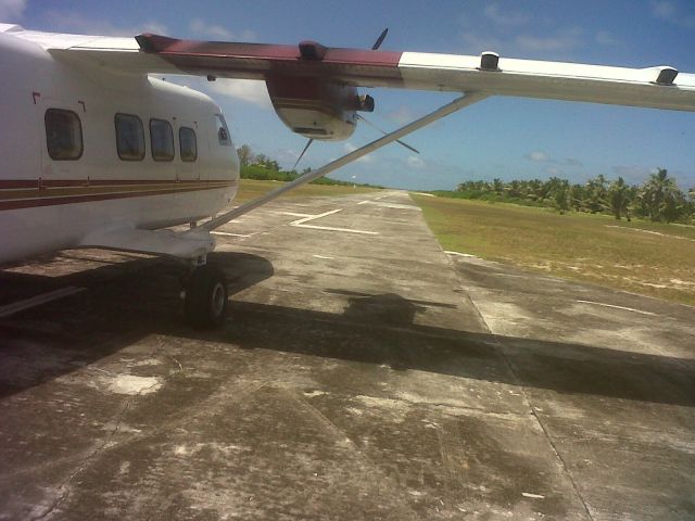 HARBIN Y-12 — - Lined up and ready for take off from an airstrip on an outer island in the Seychelles.