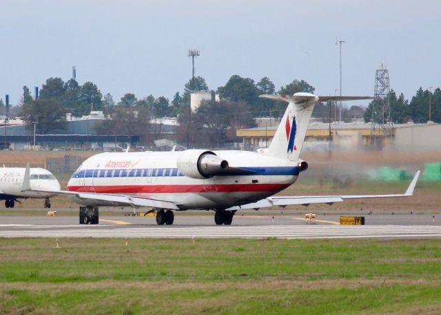 Canadair Regional Jet CRJ-200 (N902EV) - Taking off from Shreveport Regional. 2002 Bombardier CL-600-2B19