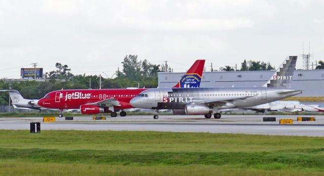 Airbus A319 (N512NK) - Holding short of Rwy 10R.