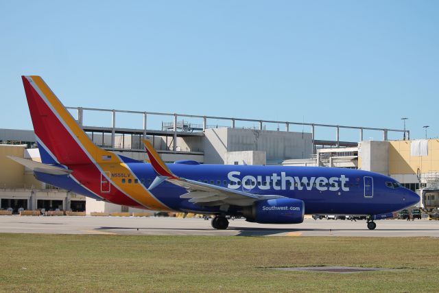 Boeing 737-700 (N555LV) - Southwest Flight 2328 taxis at Southwest Florida International Airport prior to flight to John Glenn Columbus International Airport (12/12/24)