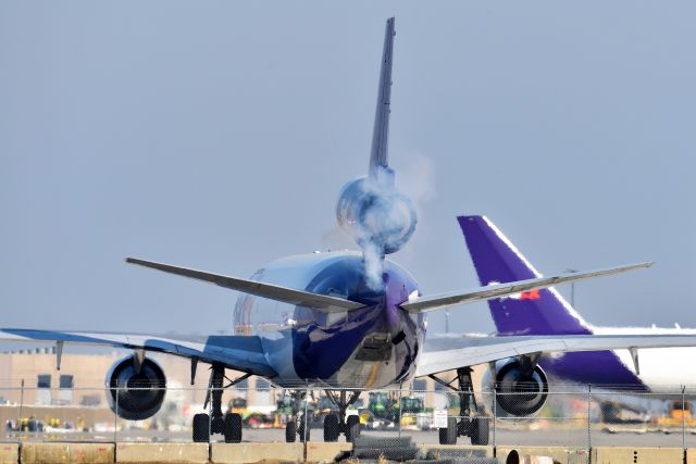 McDonnell Douglas DC-10 (N313FE) - Firing up #2 engine. Never seen a DC10 do that before.