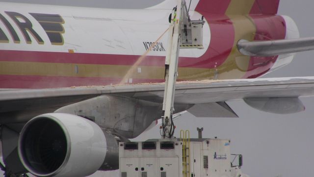 Boeing 747-200 (N795CK) - A Kalitta Air Boeing 747 being de-iced after a late May snowstorm. 