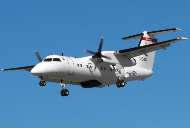 de Havilland Dash 8-100 (84-0048) - One of two USAF E-9A Widgets shooting approaches into TLH. Widget 48 is on short final for 27 here. The USAF E-9As are assigned to the 82nd Aeriel Targets Squadron in Tyndall and are used as a surveillance platform to ensure the Gulf of Mexico waters are clear of civilian boaters and aircraft during live missile launches.