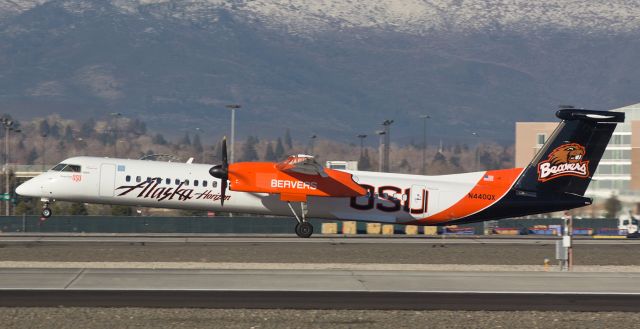 de Havilland Dash 8-400 (N440QX) - Rotating from runway 16R for the second time in the same morning.  Horizons OSU Beavers college liverybird had spent the night here at Reno and then departed before sunrise to make the daily RNO-SJC-RNO morning round-trip flight so this was my third capture of it in less than five hours.