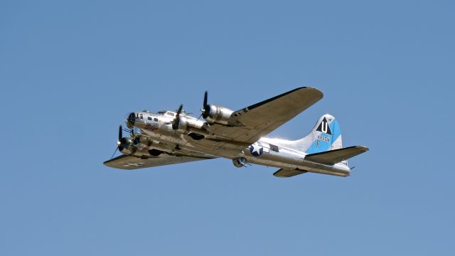 Boeing B-17 Flying Fortress (N9323Z) - CAFs B17G Sentimental Journey climbs from Rwy 34L for a flight on 8.25.15. (Ser#44-83514). 