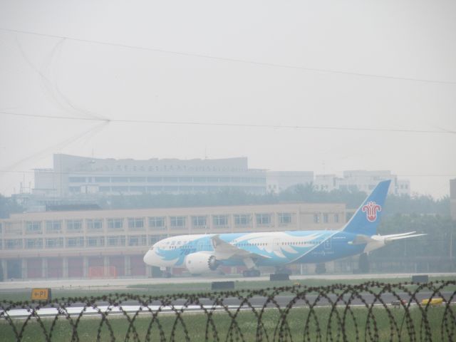 Boeing 787-8 (B-2725) - China Southern Airlines CZ3103 landing in Beijing runway 18R. Best Shot of my life!!! And I found a new plane spotting location, though it is only accessible by a trek through a nearby village and field!