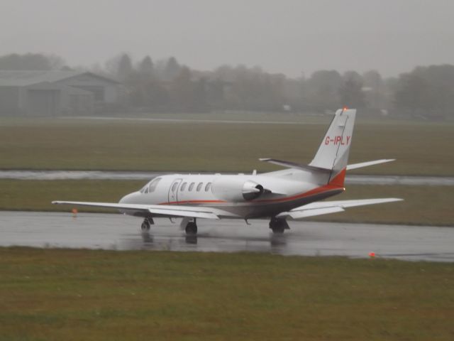 Cessna Citation II (G-IPLY) - Taking off Runway 27 at Gloucestershire Airport.