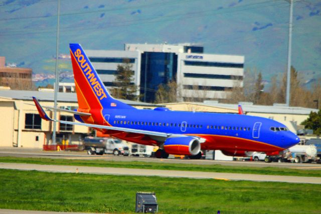 Boeing 737-700 (N951WN) - Taxiing for take off from 30R, 02-24-2013