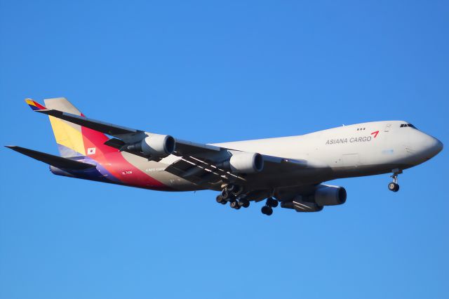 Boeing 747-400 (HL7436) - An Asiana Cargo B747-400F on final approach into Frankfurt Airport.br /br /Location: Viewpoint "West Runway"/Aussichtspunkt "Startbahn West".br /Date: 13.02.23 (dd/mm/yy).