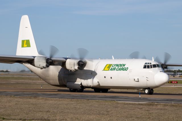 Lockheed C-130 Hercules (P4-LAE) - One of few remaining civilian C-130s called the L-100 taxis by on taxiway Charlie