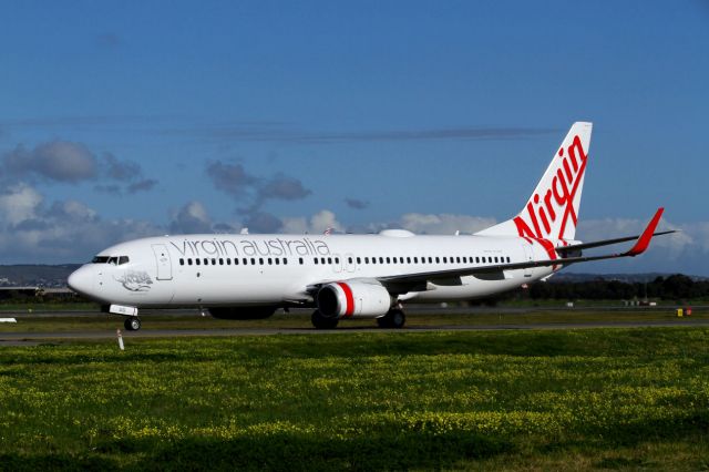 Boeing 737-700 (VH-VUG) - Virgin Australia B737-8FE is seen taxiing towards the terminal at Adelaide (YPPD) on August 14th 2012.