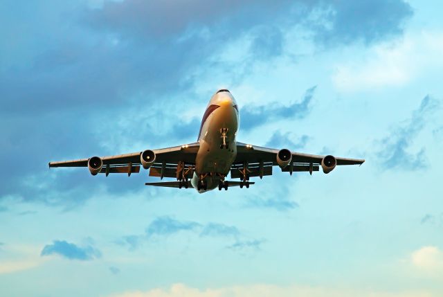 Boeing 747-200 (N715CK) - On final at sunset.