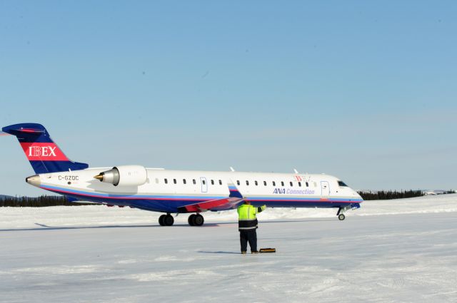 Canadair Regional Jet CRJ-700 (C-GZQC) - Callsign BBA734 heading overseas.