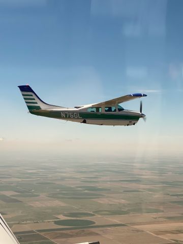 Cessna Centurion (N75GL) - Formation coming back from KGLD