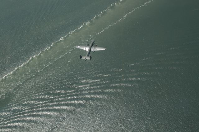 North American TB-25 Mitchell (B25) - A view from the cockpit of a P-51 (Galveston Gal) before her demise on the B-25 over Galveston Ship Channel.  A similar look WWII pilots had many years ago.