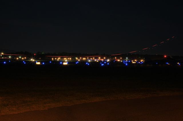 — — - Night at the Hickory Airport.