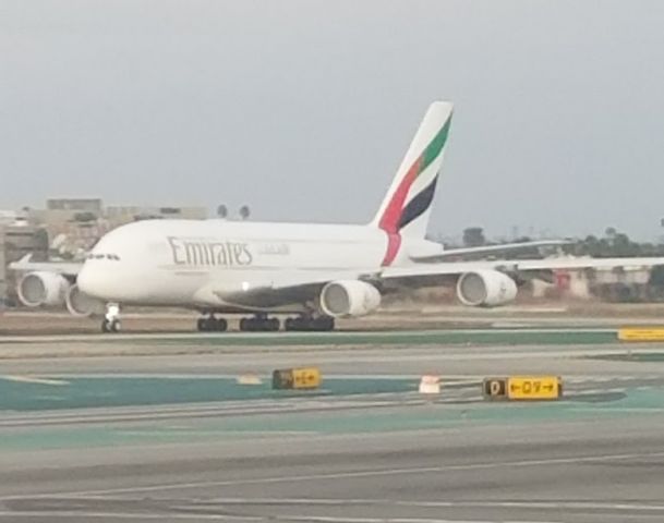 — — - Emirates-UAE Airbus 388 at full throttle--LAX