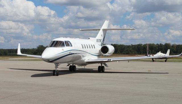 Hawker 800 (N512WC) - A Raytheon Hawker 800XP beginning to taxi on the ramp at Pryor Field Regional Airport, Decatur, AL - September 19, 2016