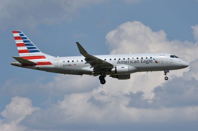 Embraer 175 (N247NN) - American Eagle / Envoy Air. Taken May 27th 2018 from Founders Plaza at KDFW.