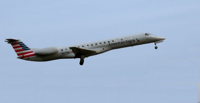 Embraer ERJ-145 (N677AE) - On final is this 2004 American Airlines Eagle  Embraer 145LR in the Autumn of 2020.