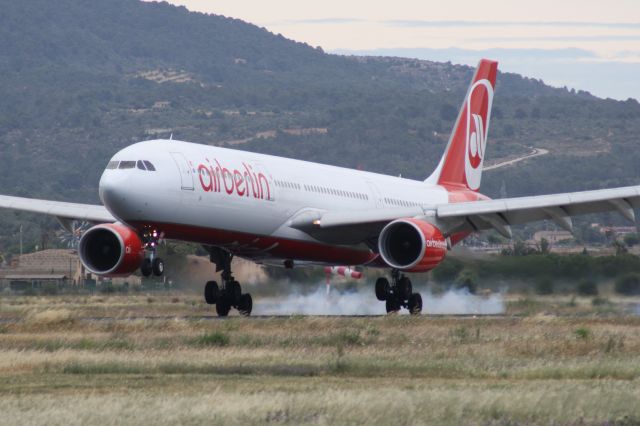 Airbus A330-300 (D-AERK) - Tuoch down with gusty winds