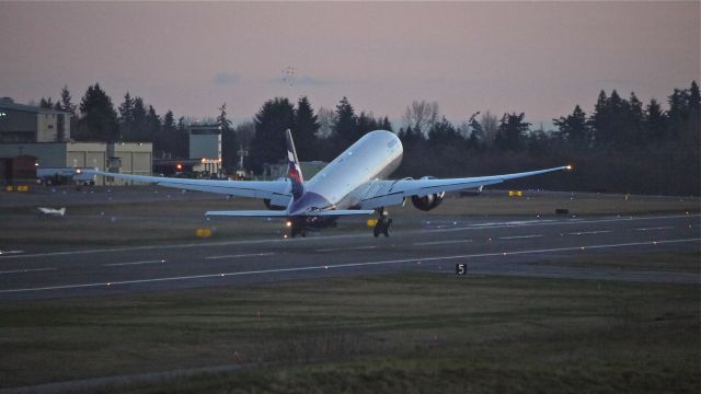 BOEING 777-300 (VP-BGB) - AFL7607 climbs from runway 16R for its delivery flight to UUEE / SVO on 2/1/13. (LN:1068 c/n 41679).