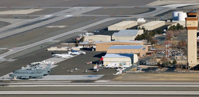 Boeing C-135B Stratolifter (58-0086) - Framed by runway 7-25 along the bottom, four military aircraft (two Fairchild-based tankers .. 58-0086 in foreground ... and two USMC Ospreys) on the left, and by the Reno Tahoe International Control Tower on the right, the Atlantic Aviation FBO agency at KRNO is seen in this midmorning photo.