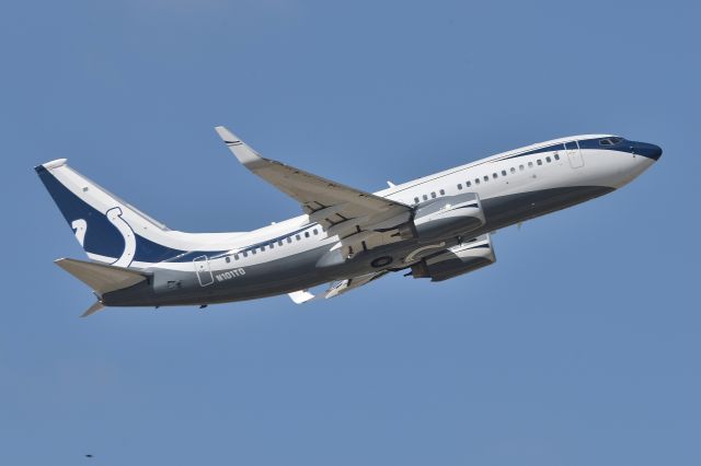 Boeing 737-700 (N101TD) - Bopper Airways. Horseshoe One. Indianapolis Colt's owner Jim Irsay's BBJ. Shown departing 5-L 0n 03-23-24.