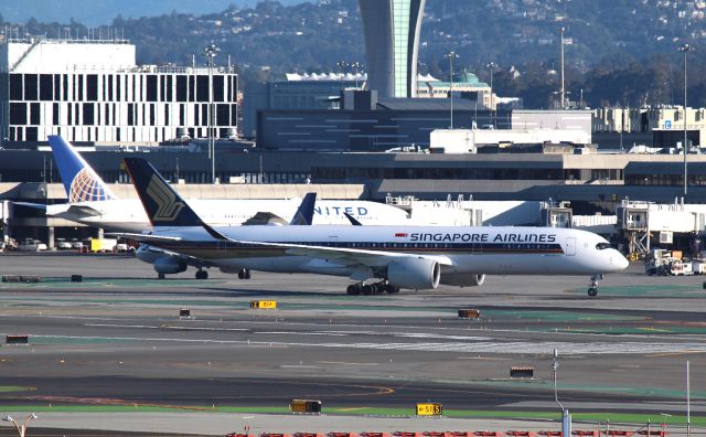 Airbus A350-900 (9V-SGG) - KSFO 11 MAR 2022 late PM arrival at San Francisco I raced over to the parking structure at SFO after the SFO Airline Collectible Show and caught my first SIA A359 rolling to the Intl Dock off 28L.