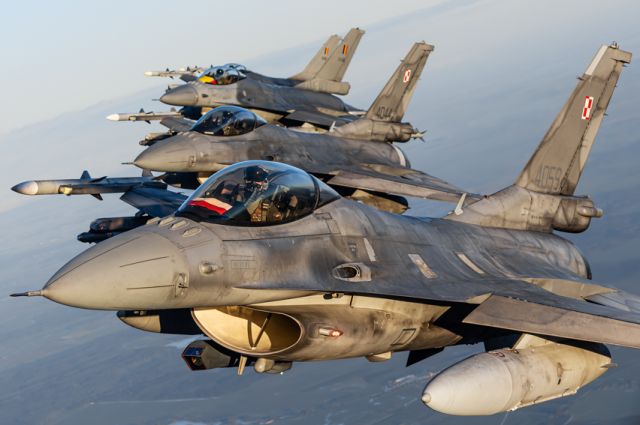 Lockheed F-16 Fighting Falcon (N4059) - January 2022, BEL and POL F-16s of NATO Baltic Air Policing, flying behind a Lithuanian C-27 overhead Siauliai AB