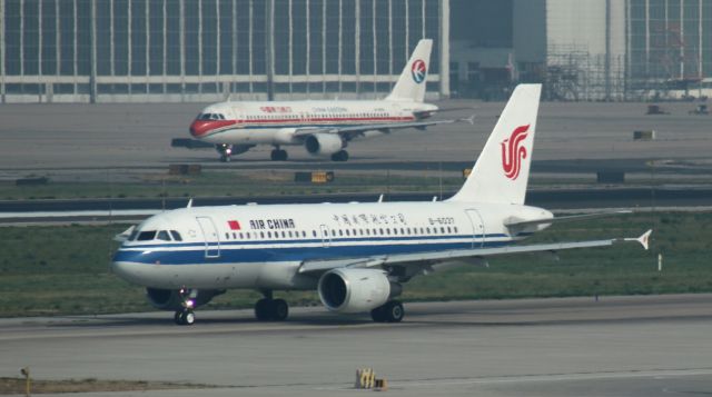 Airbus A319 (B-6037) - 6/23/18 A319s from Air China and China Eastern taxi to Rwy 36R