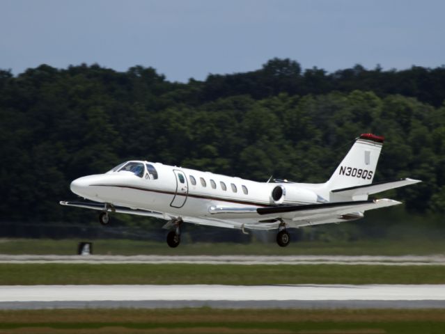 Embraer Phenom 300 (N309QS) - Take off runway 35.