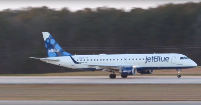 Embraer ERJ-190 (N190JB) - A JetBlue Embraer 190 takeoff at Raleigh-Durham Intl. Airport. This was taken from the observation deck on January 17, 2016 at 5:18 PM. This is flight 984 to BOS.