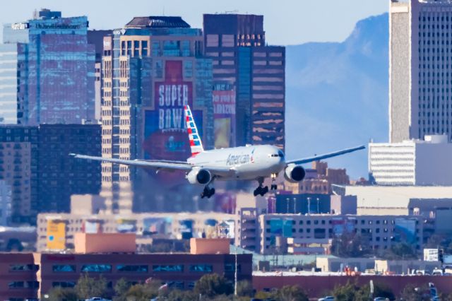 Boeing 777-200 — - An American Airlines 777-200 landing at PHX on 2/9/23 during the Super Bowl rush. Taken with a Canon R7 and Tamron 70-200 G2 lens.