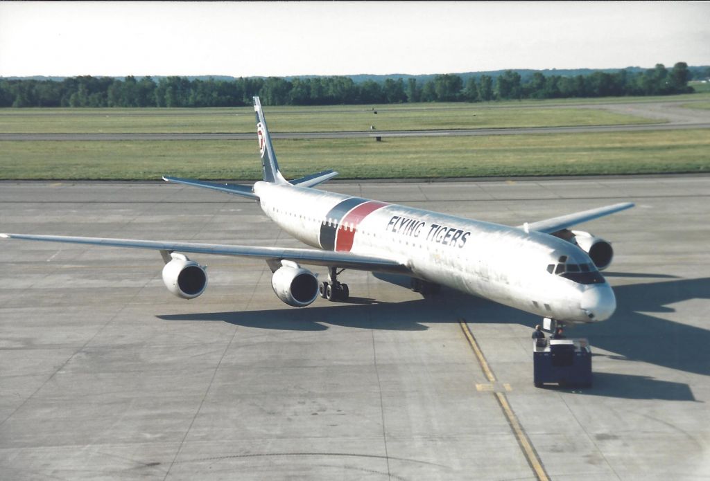 McDonnell Douglas DC-8-70 — - Scanned from a print. Pushing back. 1989.