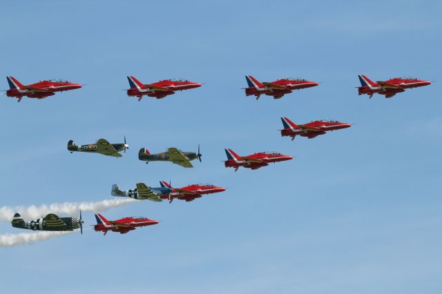 — — - Eagle Squadron performs a spectacular flypast at the Duxford Air Museum, to commemorate the 70th Anniversary of the United States Army Air Force (USAAF)arrival at RAF Duxford.