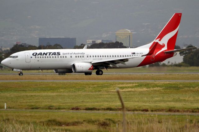 Boeing 737-800 (VH-VZY) - On taxi-way heading for Terminal 1, after landing on runway 23. Friday 5th October 2012.